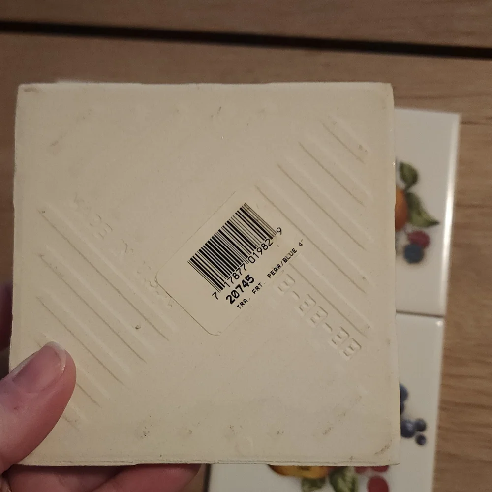 4 tile coasters with fruit and flowers